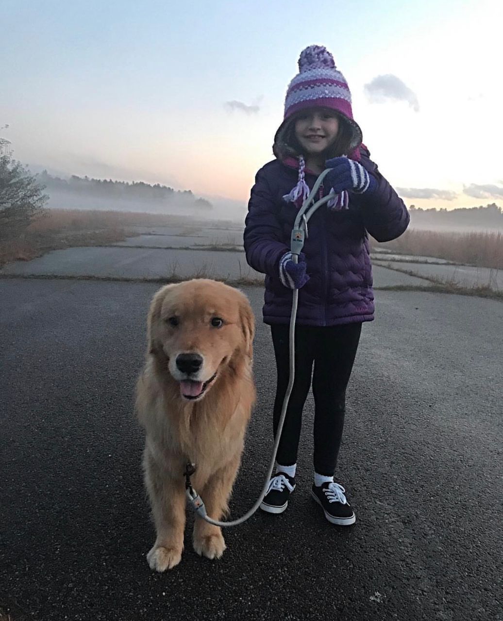 David Brown with their Golden Retriever